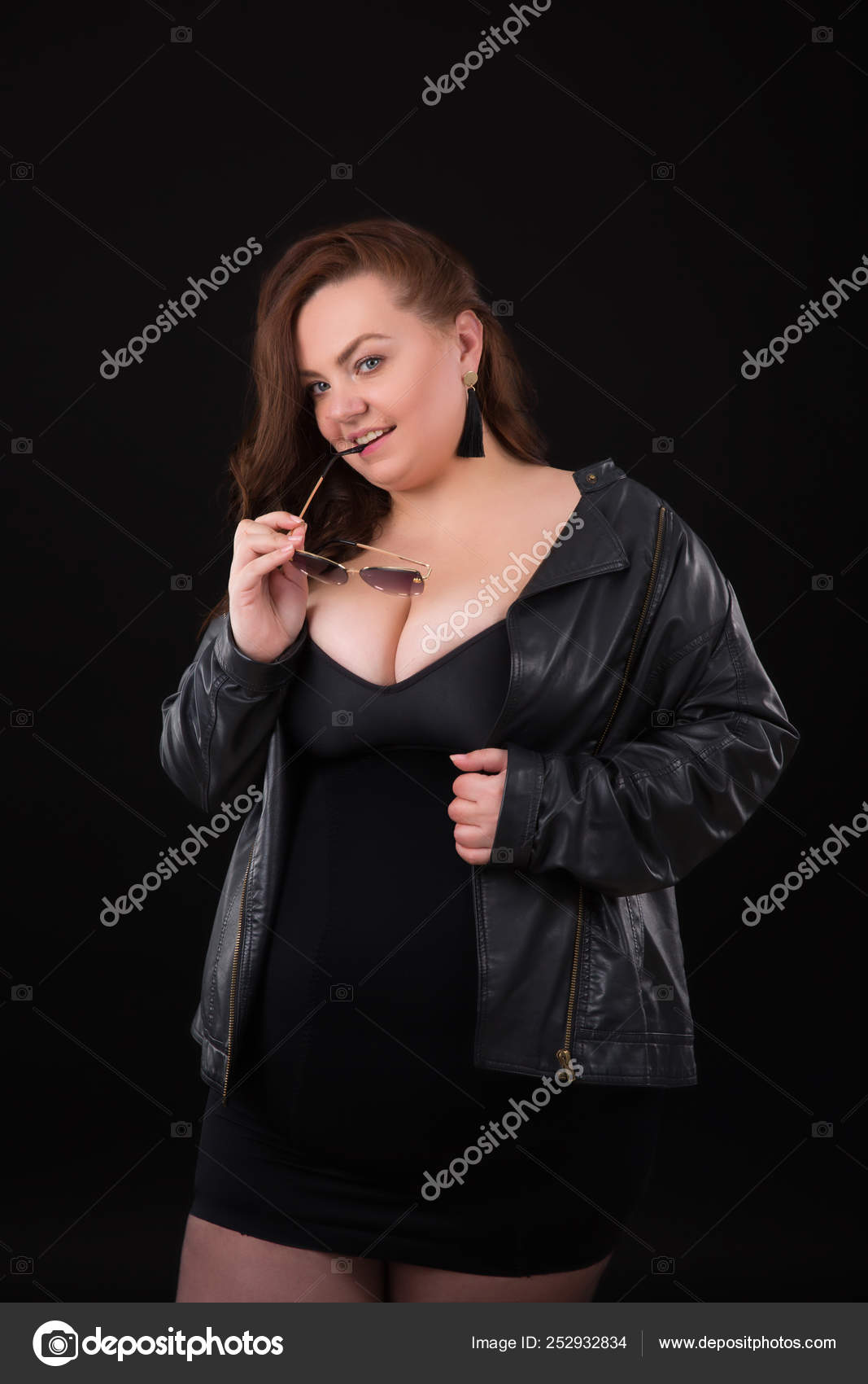 Beautiful young woman plus size with big bust in underwear and