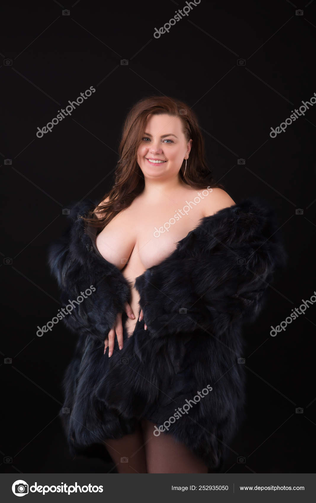Young beautiful busty curvy plus size model with big breast in black  artificial fur coat, xxl woman on black background Stock Photo by  ©sherbak.volodymir.gmail.com 252935050