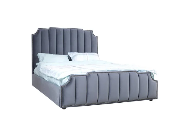 豪華な灰色の現代ベッドの家具は、室内装飾 capitone 質感のヘッドボードとファブリック寝具を備えています。浅い縞模様の布が付いている古典的な現代家具 — ストック写真
