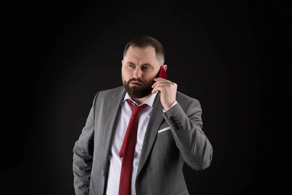 Guy call friend stand black background. Mobile call concept. Man formal suit call someone. Mobile call conversation. Mobile negotiations. Businessman well groomed mature man hold smartphone. — Stock Photo, Image
