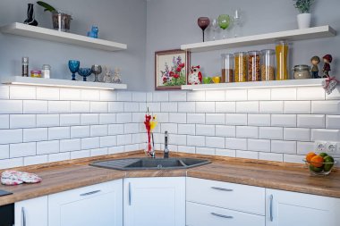 White Kitchen bench shelves with various food ingredients on white background clipart