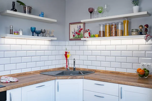 White Kitchen bench shelves with various food ingredients on white background