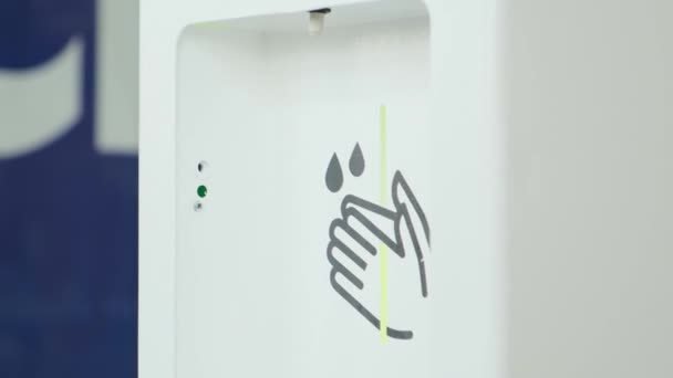 Close Washing Hands Automatic Alcohol Sanitizer Dispenser Mall Woman Hand — Stock Video