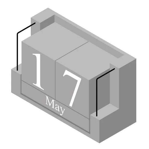 Data de 17 mai pe un calendar de o singură zi. Calendarul blocului de lemn gri prezent data 17 și luna Mai izolat pe fundal alb. Vacanţă. Sezonul. Ilustrație izometrică vectorială — Vector de stoc