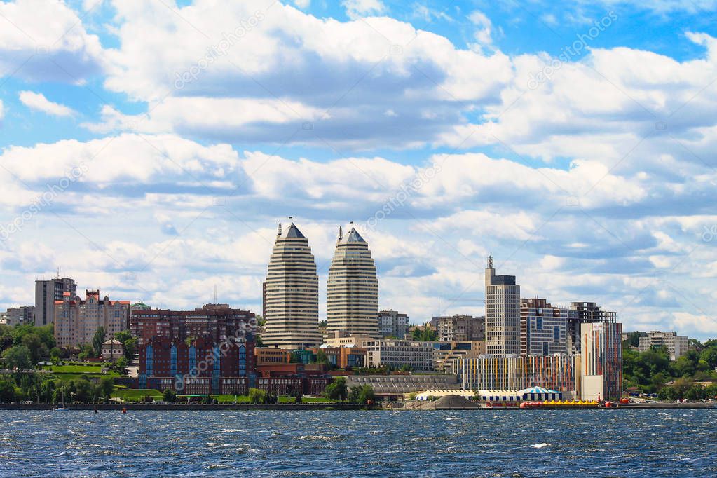 Waves and clouds over the Dnieper River, view of skyscrapers, towers and Embankment of the Dnipro city, Ukraine, (Dnepropetrovsk, Dnipropetrovsk. Dnepr)