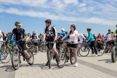 Dnepr city, Ukraine, May 26,  2018. Guys and girls ride bikes during the cycling festival in  Dnipro.  Bike Day Dnepropetrovsk