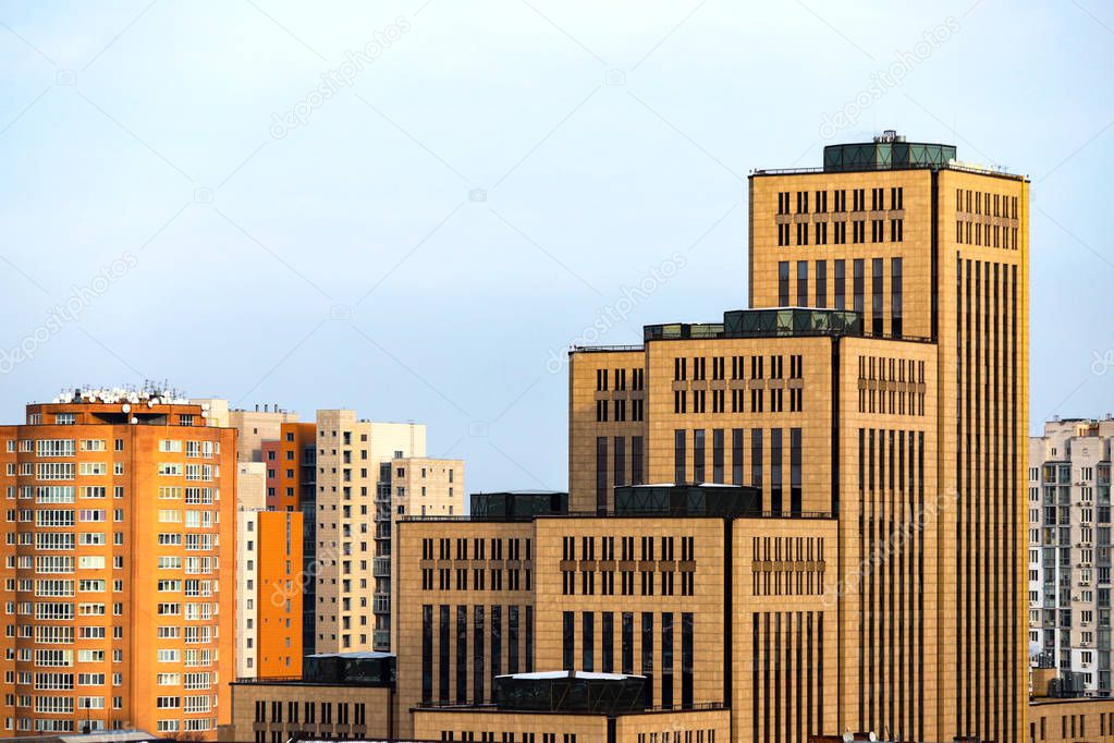 View of the big city, tall yellow buildings, towers and skyscrapers in Dnipro city, Dnepropetrovsk Ukraine.