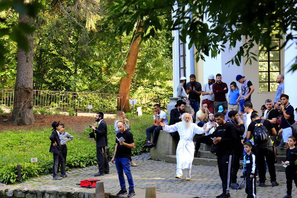 September 13, 2018, Uman Ukraine. Hasidic Jews dance, sing and pray during the Jewish New Year in the park, religious orthodox Jew