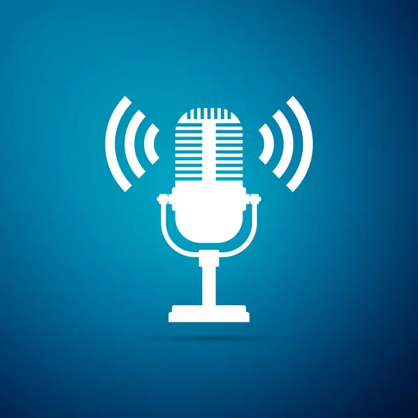 Microphone icon isolated on blue background. On air radio mic microphone. Speaker sign. Flat design. Vector Illustration