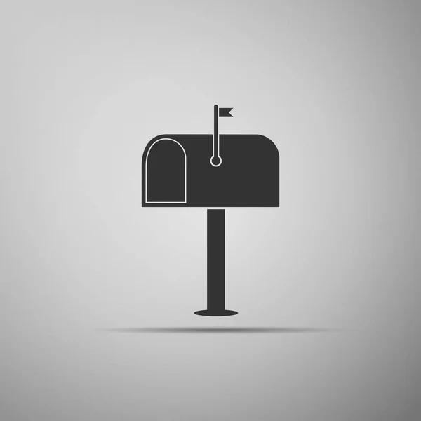 Icono de buzón aislado sobre fondo gris. Icono del buzón. Buzón de correo en poste con bandera. Diseño plano. Ilustración vectorial — Vector de stock