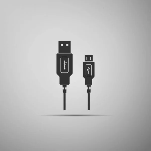 USB Micro kabels pictogram geïsoleerd op een grijze achtergrond. Stekkers en stopcontacten voor Pc en mobiele apparaten. Computer randapparatuur connector of smartphone opladen in het stopcontact. Platte ontwerp. Vectorillustratie — Stockvector