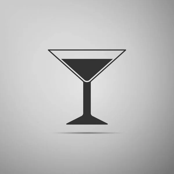 Martini glass icon isolated on grey background. Cocktail icon. Wine glass icon. Flat design. Vector Illustration — Stock Vector