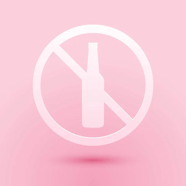 Paper cut No alcohol icon isolated on pink background. Prohibiting alcohol beverages. Forbidden symbol with beer bottle glass. Paper art style. Vector — Stock Vector
