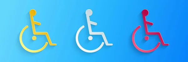 Cięcie papieru Niepełnosprawna ikona niepełnosprawności odizolowana na niebieskim tle. Znak upośledzenia wózka inwalidzkiego. Papier w stylu sztuki. Wektor — Wektor stockowy
