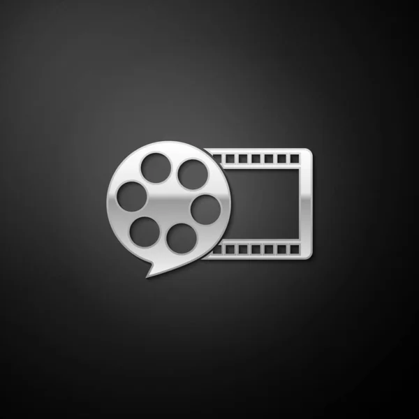 Silver Film reel and play video movie film icon isolated on black