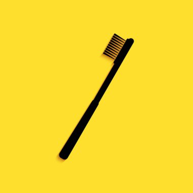 Sarı arkaplanda siyah diş fırçası simgesi izole edildi. Uzun gölge tarzı. Vektör.