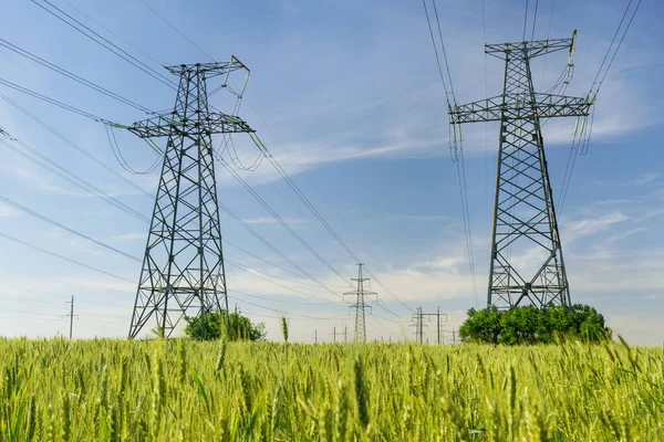 High-voltage  power lines. Electricity distribution station. high voltage electric transmission tower. Distribution electric substation with power lines and transformers.