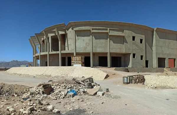 Unfinished hotel building in a beach resort.