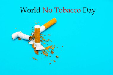 Dünya Tütünsüz Günü. Mavi arka planda sigarasız sağlıklı yaşam biçimleri kavramı.
