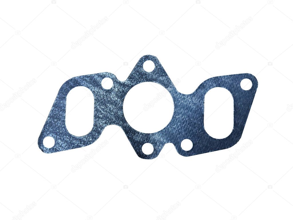 Metal gasket of the exhaust manifold of the car on an isolated white background. Spare parts.