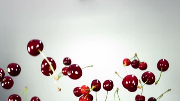 Close-up of cherry rotates in the air — Stock Video