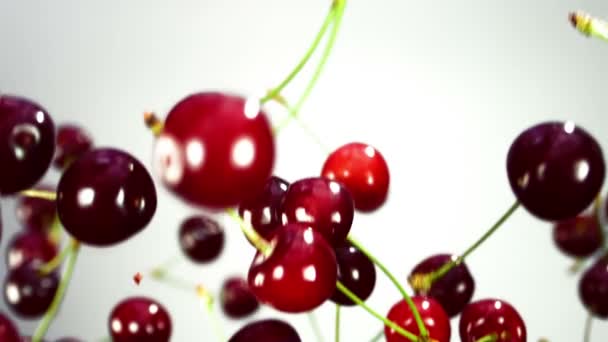 Close-up of cherry rotates in the air — Stock Video