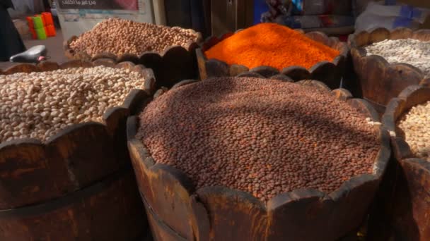 Different types of legumes are in barrels — Stock Video