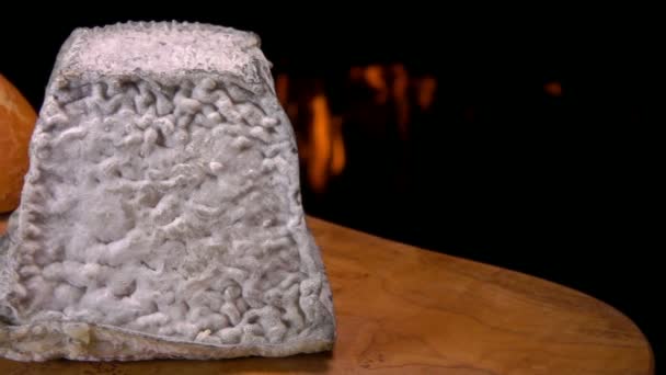 Pyramid of unpasteurised soft goats-milk cheese and bred — Stock Video