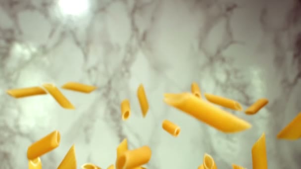 Pasta Penne flyi в воздухе — стоковое видео