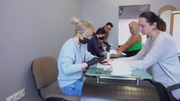 Manicure masters take part in retraining courses — Stock Video
