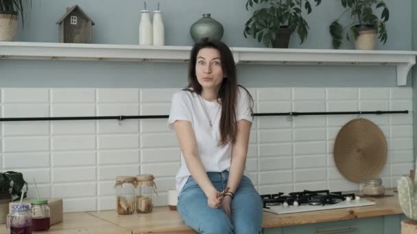 Young Woman Sitting Table Kitchen Candy Girl Looking Camera Smiling — Stock Video