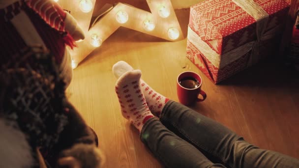 Girl Christmas Socks Warm Place Woman Red Cup Tea Coffee — Stock Video