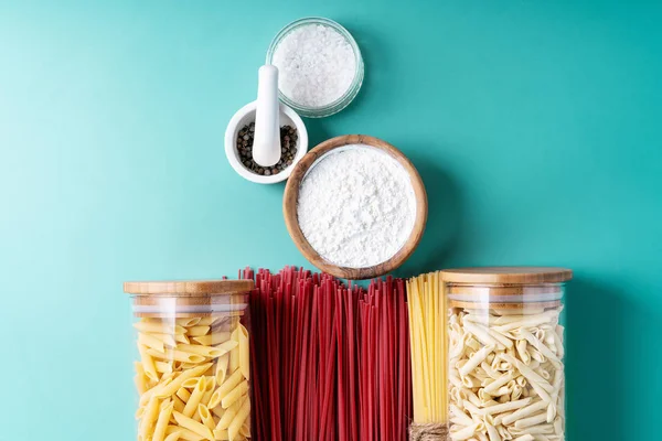 Raw ingredients for cooking: Italian red grape spaghetti pasta — Stock Photo, Image