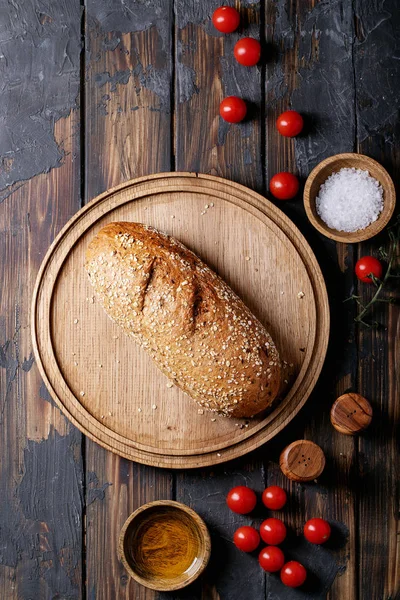 Rustic bread with tomatoes — Stock Photo, Image