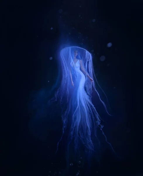 A jellyfish girl floating in levitation on a dark ocean floor. A beautiful, white dress and a hat with tentacles fluttering about the water. Space, alien creation. Art photo