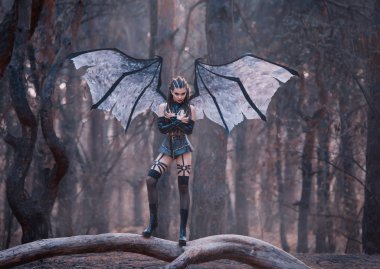 girl bat with bloody cruel smile in sexy costume of black latex skirt, leather belts and stockings, forest demon attacks innocent wanderers, incarnation of succubus, lustful lady with wings and claws clipart