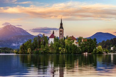 Lake Bled Slovenia. Beautiful mountain lake with small Pilgrimage Church. Most famous Slovenian lake and island Bled with Pilgrimage Church of the Assumption of Maria. Bled, Slovenia, Europe.  clipart