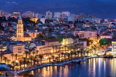 Amazing Split city waterfront panorama at blue hour, Dalmatia, Europe. Roman Palace of the Emperor Diocletian and tower of Saint Domnius cathedral. Split, Croatia.  clipart