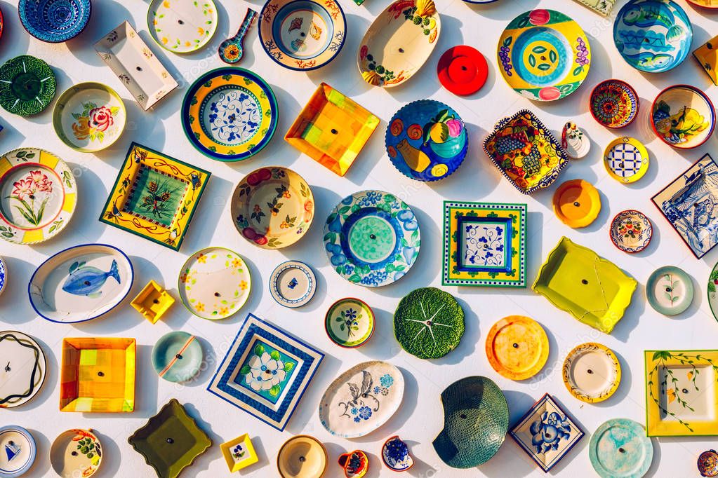 Collection of colorful Portuguese ceramic pottery, local craft p