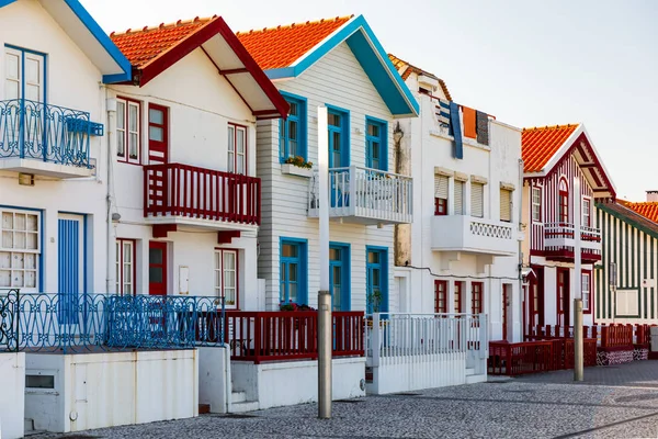 Street with colorful houses in Costa Nova, Aveiro, Portugal. Str