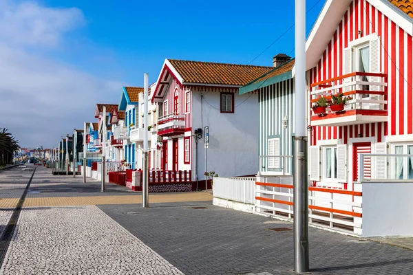 Street with colorful houses in Costa Nova, Aveiro, Portugal. Str