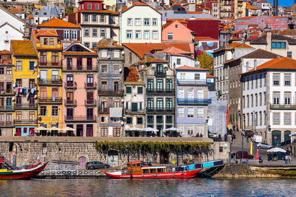 Ancient city of Porto with old multi-colored houses with red roo