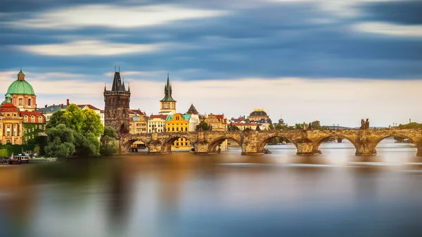View of the Vltava River and the bridges shined with the sunset — Stock Photo, Image