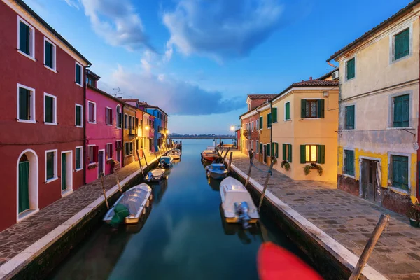 Street view with colorful buildings in Burano island, Venice, It
