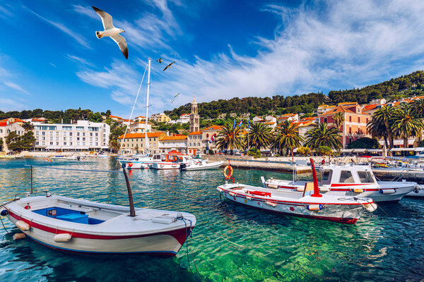 View at amazing archipelago with fishing boats in front of town 