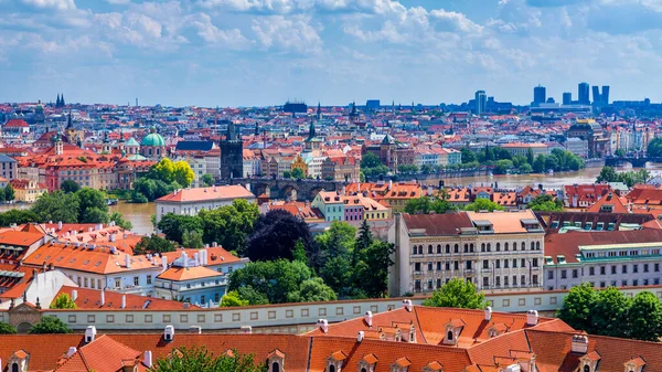Prague red roofs and dozen spires of historical Old Town of Prag