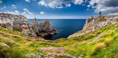 Panorama of Pointe du Pen-Hir with World War Two monument to the Bretons of Free France on the Crozon peninsula, Finistere department, Camaret-sur-Mer, Parc naturel regional d'Armorique. Brittany (Bretagne), France. clipart