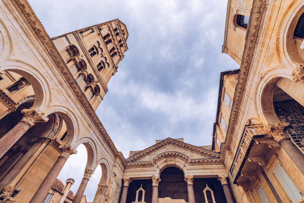 Diocletian's Palace's peristyle in front of Cathedral of Saint Domnius' bell tower in Split, Croatia. Diocletian palace UNESCO world heritage site in Split, Dalmatia, Croatia.