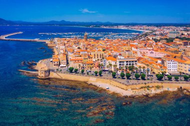 Aerial view over Alghero old town, cityscape Alghero view on a beautiful day with harbor and open sea in view. Alghero, Italy. Panoramic aerial view of Alghero, Sardinia, Italy.  clipart