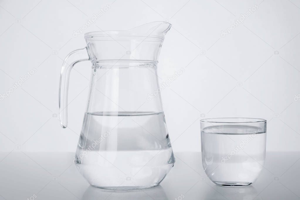 A pitcher and a glass. Pure water.